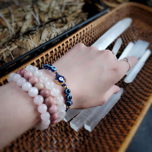 
                  
                    Load image into Gallery viewer, Evil Eye Blue Thread Bracelet
                  
                