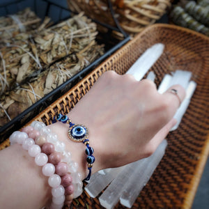 
                  
                    Load image into Gallery viewer, Evil Eye Blue Thread Bracelet
                  
                